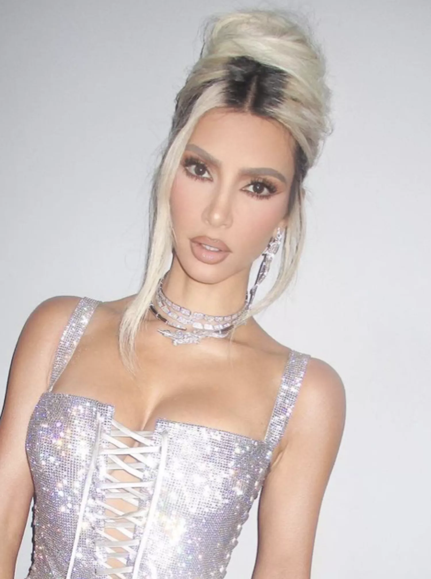 Kim Kardashian's Greatest Hair Moments: Blonde Rooty Updo