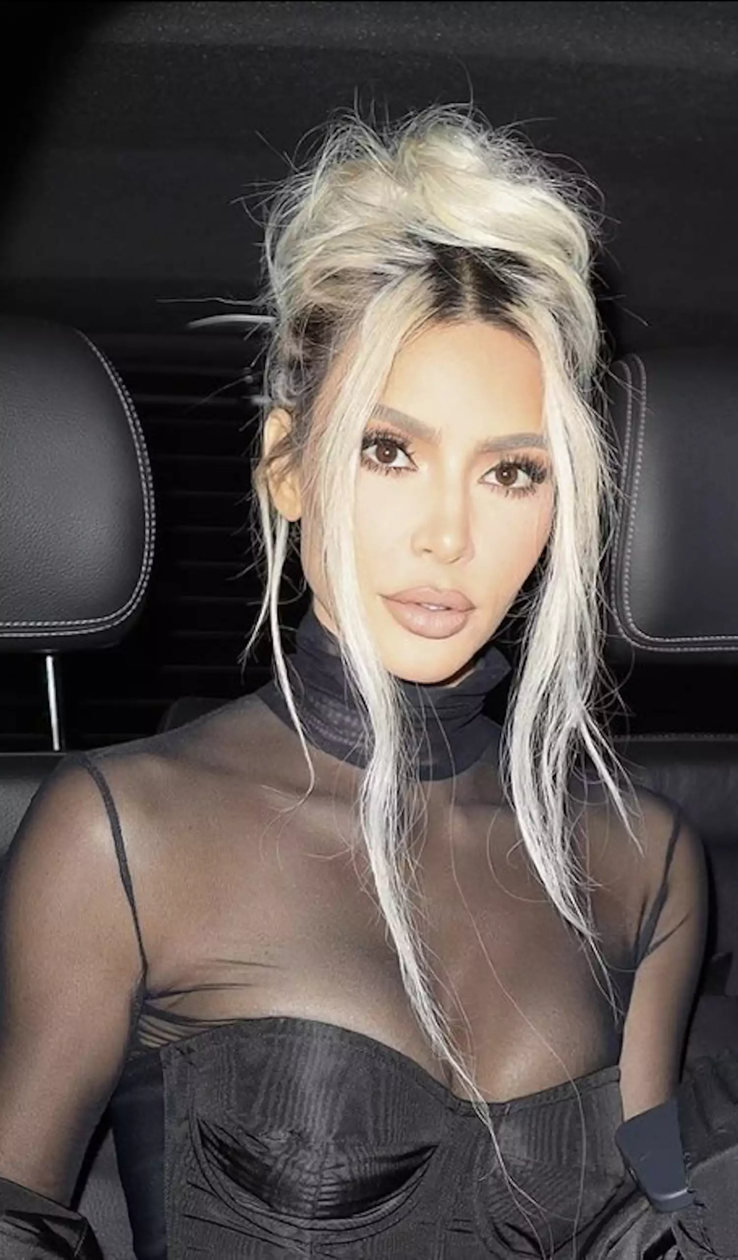 Kim Kardashian's Greatest Hair Moments: Loose and Textured Blonde Updo