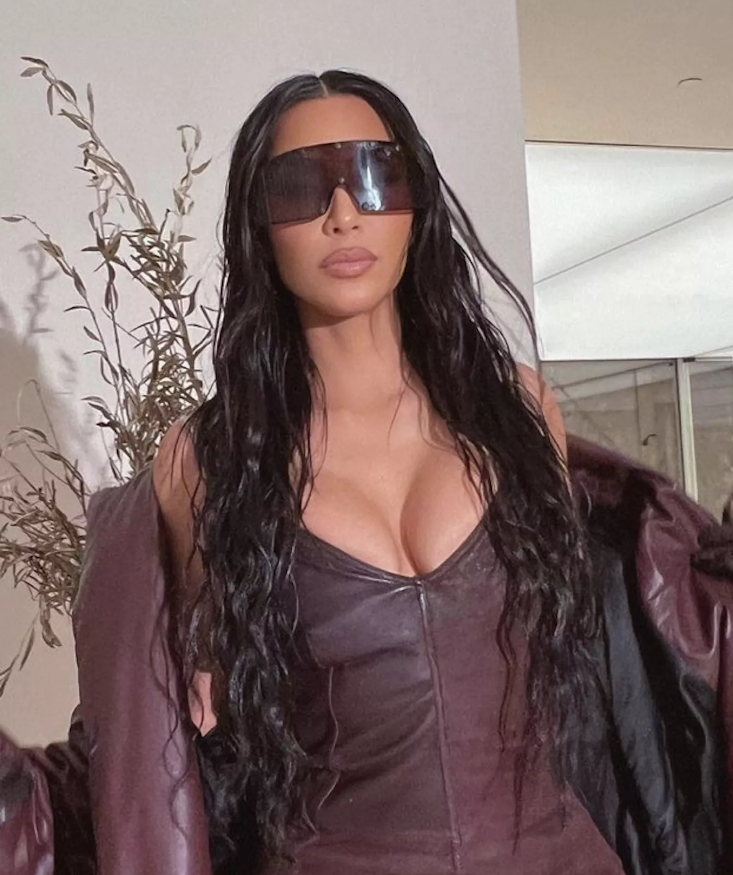 Kim Kardashian's Greatest Hair Moments: Center-Parted Wet Look Waves With Extensions